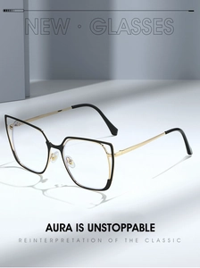Detail of stylish cat-eye glasses frame in black and gold metal with blue light lenses