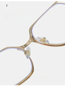 Detail of golden metal frame with adjustable soft silicone nose pads for comfort