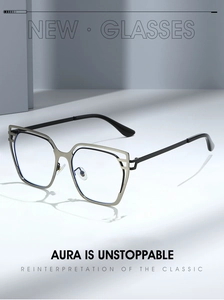 Detailed side view of stylish cat-eye glasses with gold and black metal layered frames