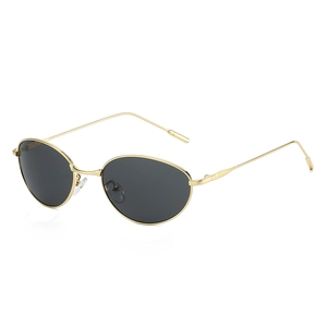 Lunettes de soleil ovales en métal doré avec verres gris foncé pour mode extérieure