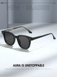 Detailed close-up of stylish black square frame sunglasses with silver stud accents