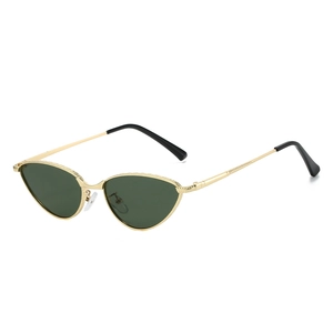 Retro cat-eye sunglasses with gold metal frame and dark green lenses in side view