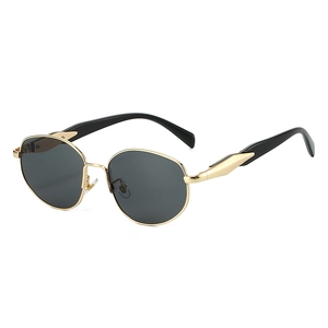 Retro round metal sunglasses with gold frames and dark lenses for a stylish street look