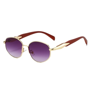 Retro round sunglasses with purple gradient lenses and gold metal frames