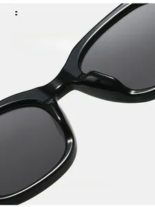 Detail showing comfortable integrated nose pads on black thick-frame sunglasses
