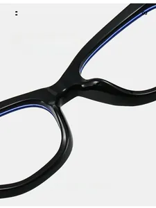 Detail view of the integrated nose pad design on black TR90 cat-eye eyewear frames