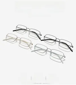 Collection of minimalist rectangular metal eyewear frames in black, silver, and gold finishes
