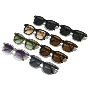 Multiple retro square sunglasses in various colors displayed on a white background