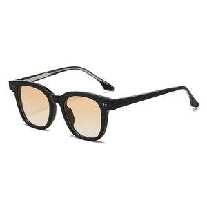 Trendy thick frame black sunglasses with orange gradient lenses and silver rivet details