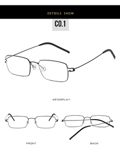 Macro detail of slim black metal frame glasses showing front and back view of rectangular lenses