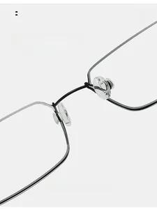 Detail of ultra-light metal glasses frame with comfortable anti-slip silicone nose pads