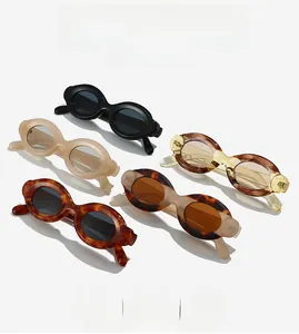 Detailed collection of thick oval frame sunglasses in assorted solid and tortoise colors