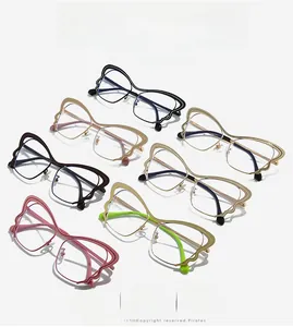 Detailed grid of butterfly eye glasses frames in multiple colors with wavy metal design