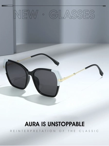 Detail showing high-quality black and white contrast frame with slim golden metal temples