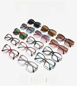 Flat lay of square sunglasses in tortoiseshell, transparent and solid frames with metal temples