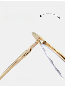 Detail of durable gold metal hinge on butterfly frames with anti-blue light coating