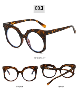 Detail view of tortoiseshell round frames with embossed textures from multiple angles