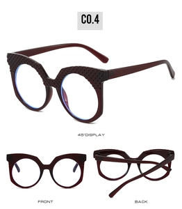 Three-way view of deep red round glasses showing 45-degree angle front and back details