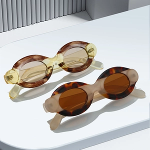 Retro oval thick frame sunglasses in amber and tortoiseshell with UV protection