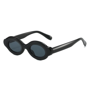 Retro black oval thick frame sunglasses with dark grey UV protective lenses in a 45-degree view
