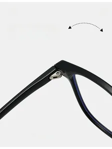 Macro shot of durable metal hinge and silver screws on black square eyeglass frames