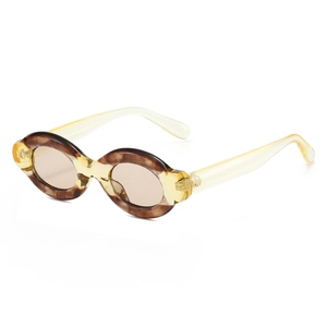 Retro thick oval tortoise shell sunglasses with translucent yellow temples and UV protection