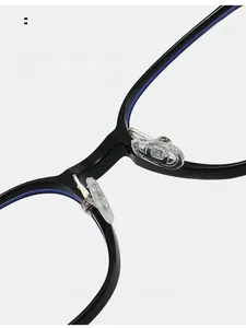 Close-up of comfortable transparent nose pads on stylish black anti-blue light glasses