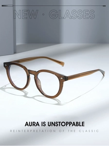 Detail view of transparent brown TR90 frames with stylish metal rivet decorative accents