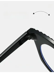 Detail of durable texture hinge on black round frame glasses showing the fold mechanism