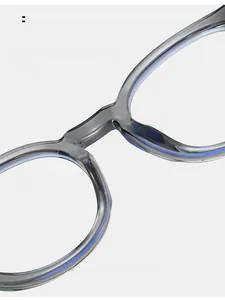 Close-up of comfortable nose pads on translucent grey TR90 frames for long-term wear