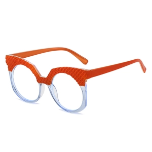 Cat eye fashion glasses with orange textured frames and blue transparent accents