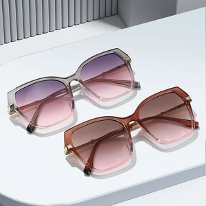 Retro square frame sunglasses in grey and tea colors with chic gold accents and gradient lenses