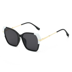 Retro oversized square frame sunglasses with black and white contrast and gold metal temples