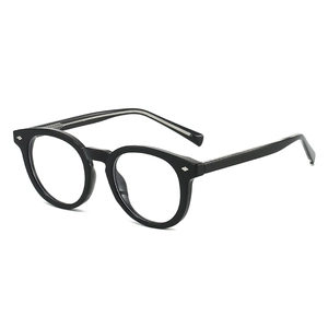 Classic round black TR90 frame sunglasses with rivet accents and UV protection