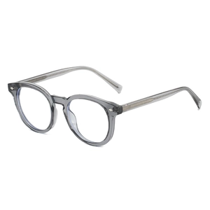 Modern translucent grey TR90 round frame eyeglasses with stylish silver rivet details