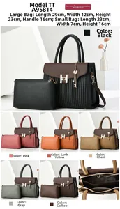 Détail du grand sac cabas en cuir grainé avec boucle H et pochette assortie incluse