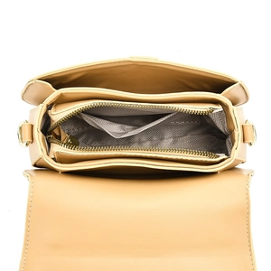 Interior view showing two compartments and a zipper pocket in a khaki leather bag