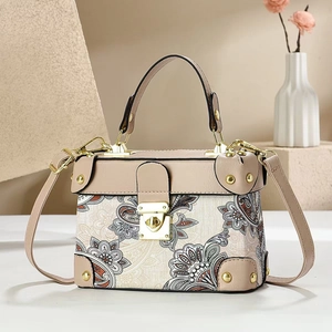 Elegant beige floral hand bag with vintage metallic clasp and detachable shoulder strap