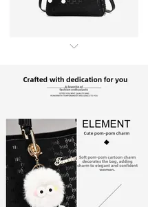 Detail of black tote bag featuring golden logo and white faux fur cartoon charm