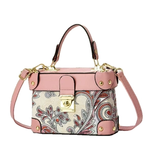 Pink paisley print tote bag for women with luxury gold hardware and top handle
