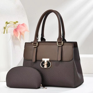 Minimalist dark coffee woven leather tote bag with small pouch set on white background