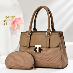 Brown woven tote bag and clutch set with leather trim and gold metal T-lock detail