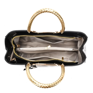 Top view of leopard tote bag interior with multiple compartments and herringbone lining