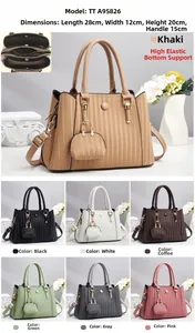 Close-up of pleated women handbag with 28x12x20cm size label and multiple color swatches