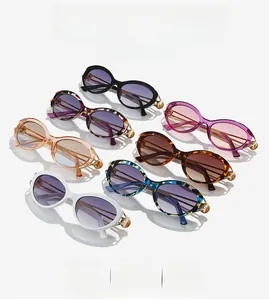 Detailed overhead view of cat eye sunglasses in multiple colors with metal hollow temples