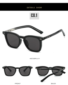 Detailansicht der schwarzen quadratischen Sonnenbrille mit silbernen Nieten und UV-Schutz
