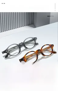 Detail of vintage round TR90 eyewear with silver rivets and metal core engraving