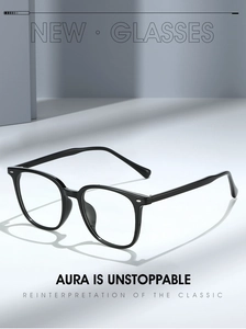 Close-up of classic black square frame glasses with polished finish and clear lenses