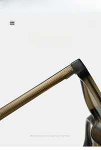 Detail of amber translucent eyeglass frames with textured non-slip temple structure
