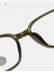 Detail view of the integrated nose pads on brown acetate sunglasses for comfort